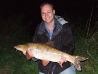 Glenn with a 13-01 barbel from the R Wensum