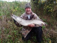 Trevor with a pike of over 20 lbs